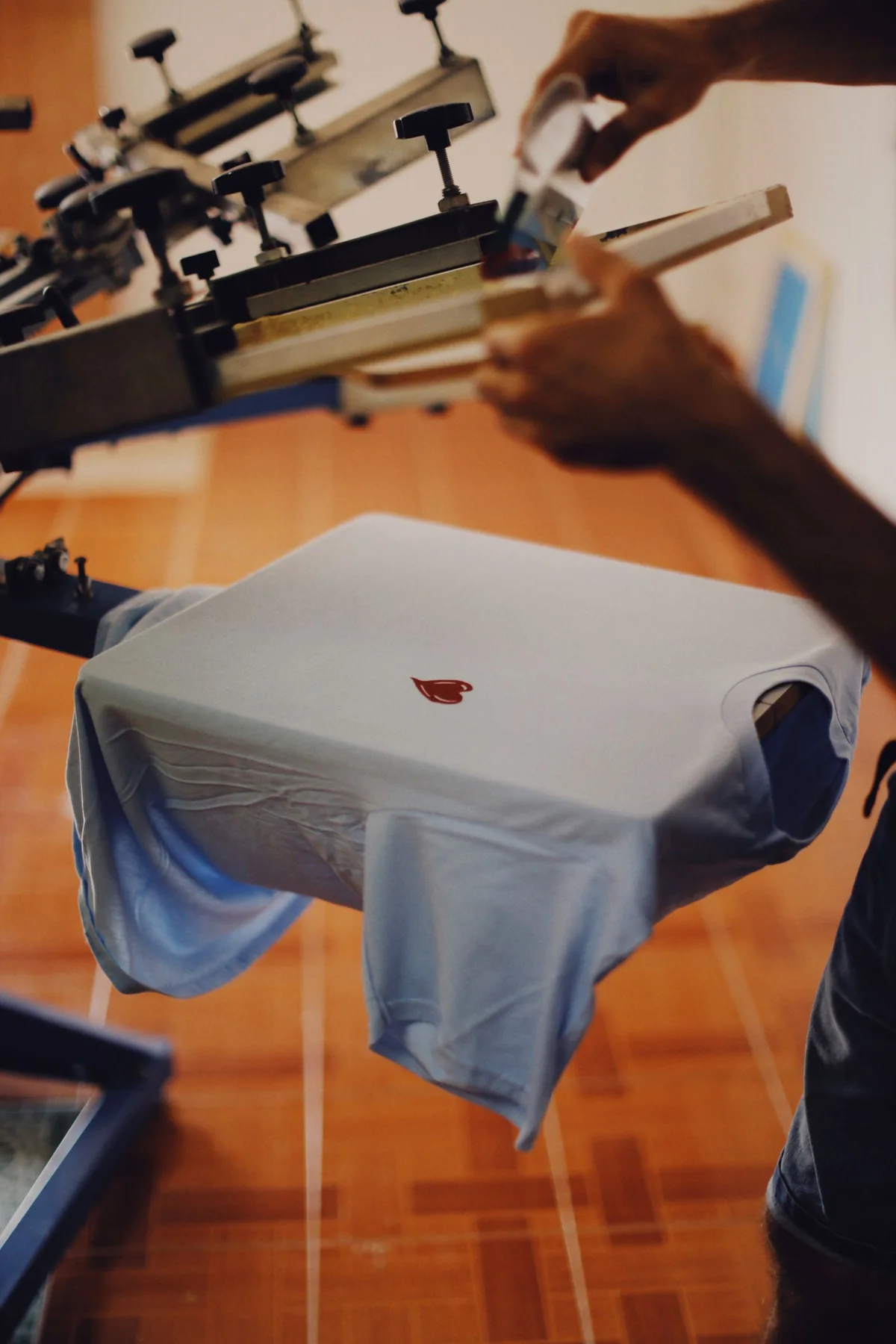 A screen-printing process in a print workshop.
